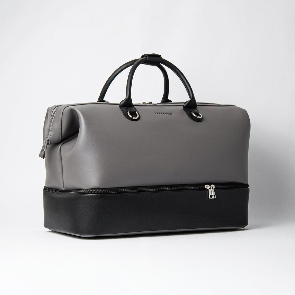 Ashen vegan leather duffel bag – angled view
